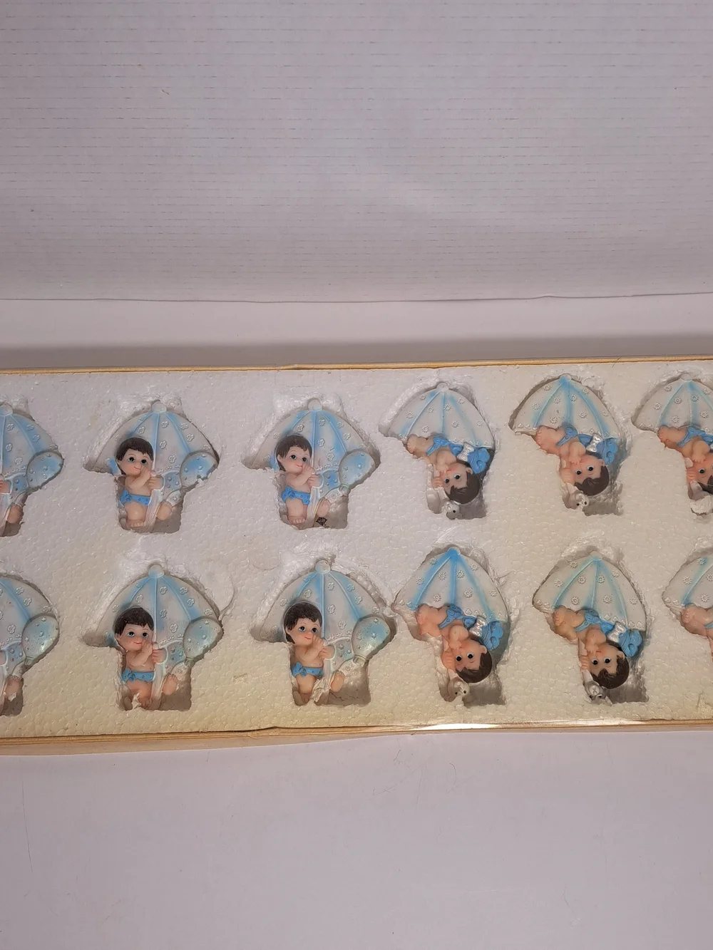 Blue Baby Ceramic Figurines with a Magnet on the back. Great for Baby Shower